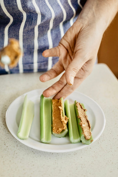 A twist on a classic favorite, with PB Love peanut and almond butters. Celery stick snack.