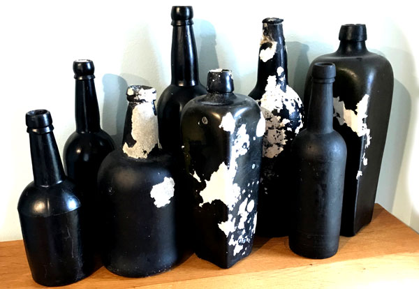 black glass sea glass bottles