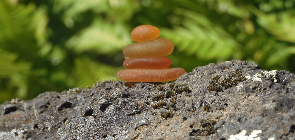 stack of amber sea glass