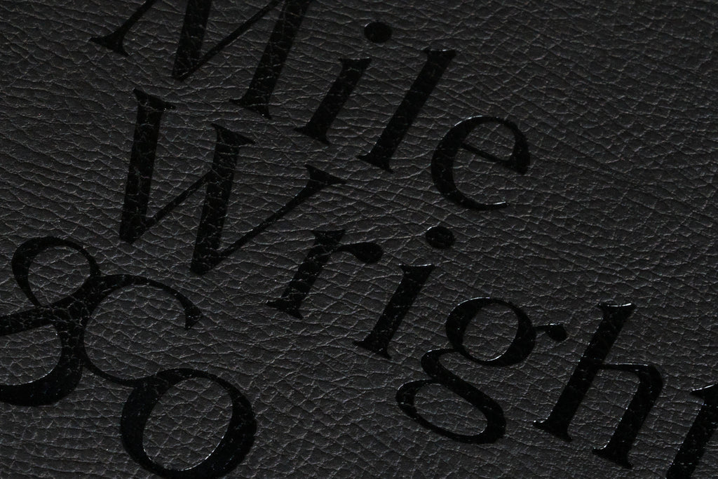 black on black graphic design Mile Write Co