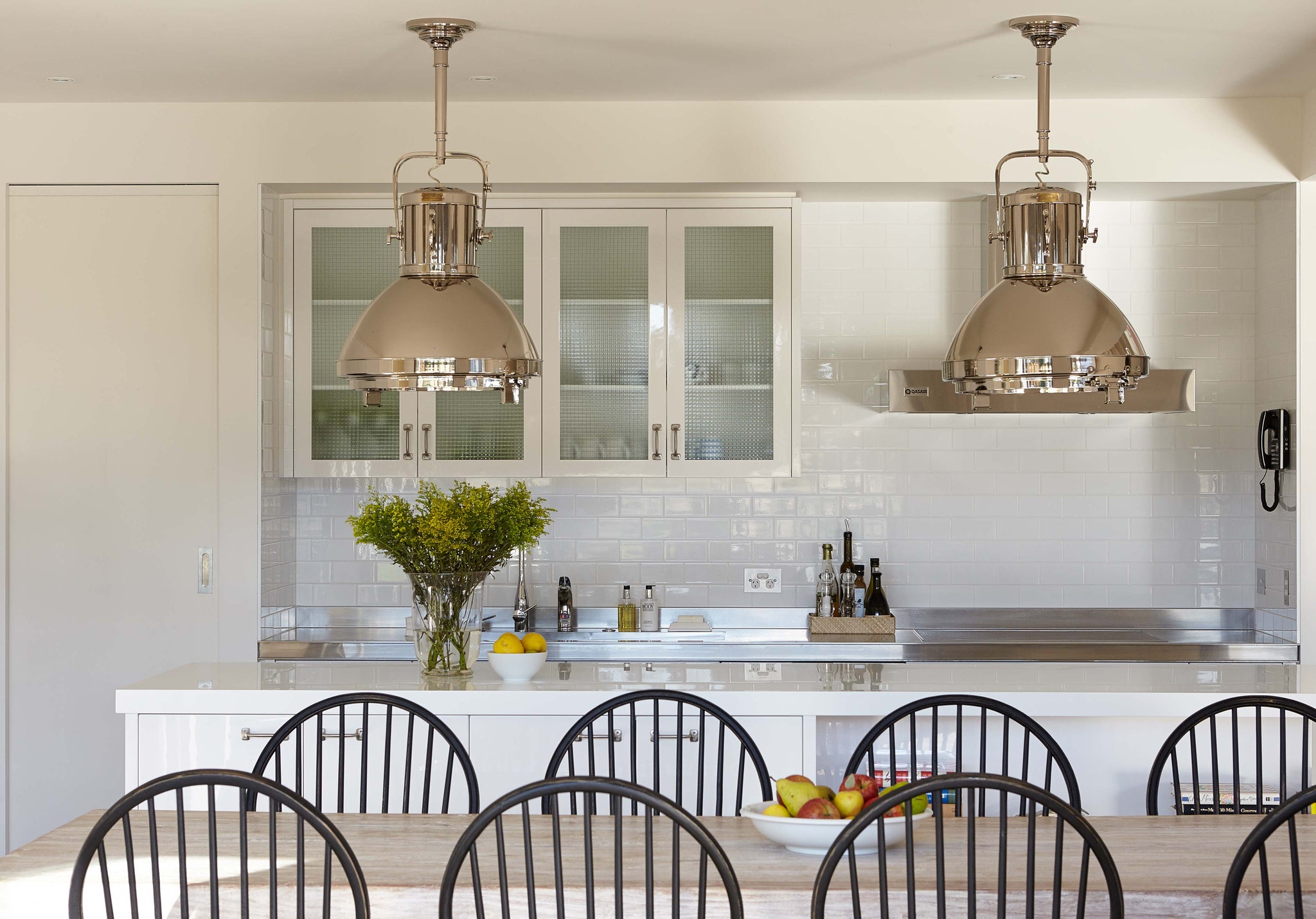 Kitchen with large nickel lights