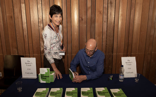 Guests have their books signed by Graham.