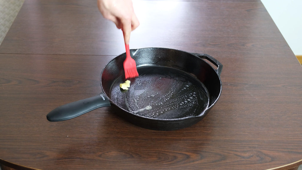 buttering the 12 inch cast iron skillet
