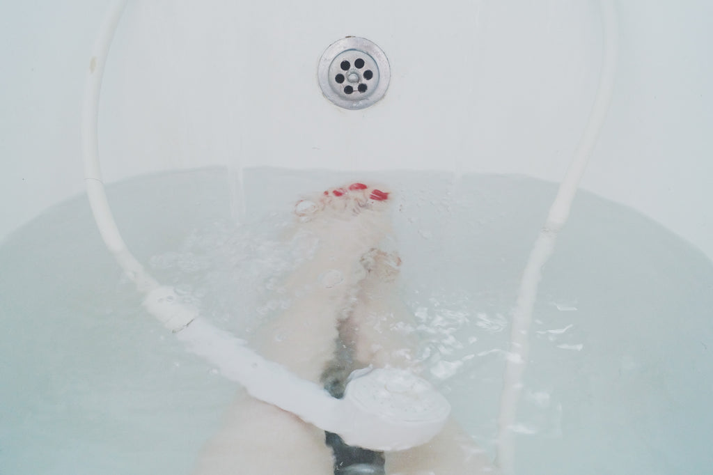woman bath feet relax