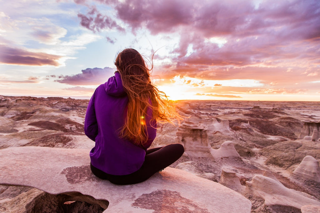 long red hair woman mountaintop