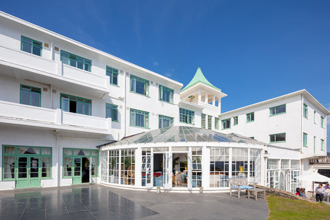 The hotel exterior, showing the sunlit conservatory
