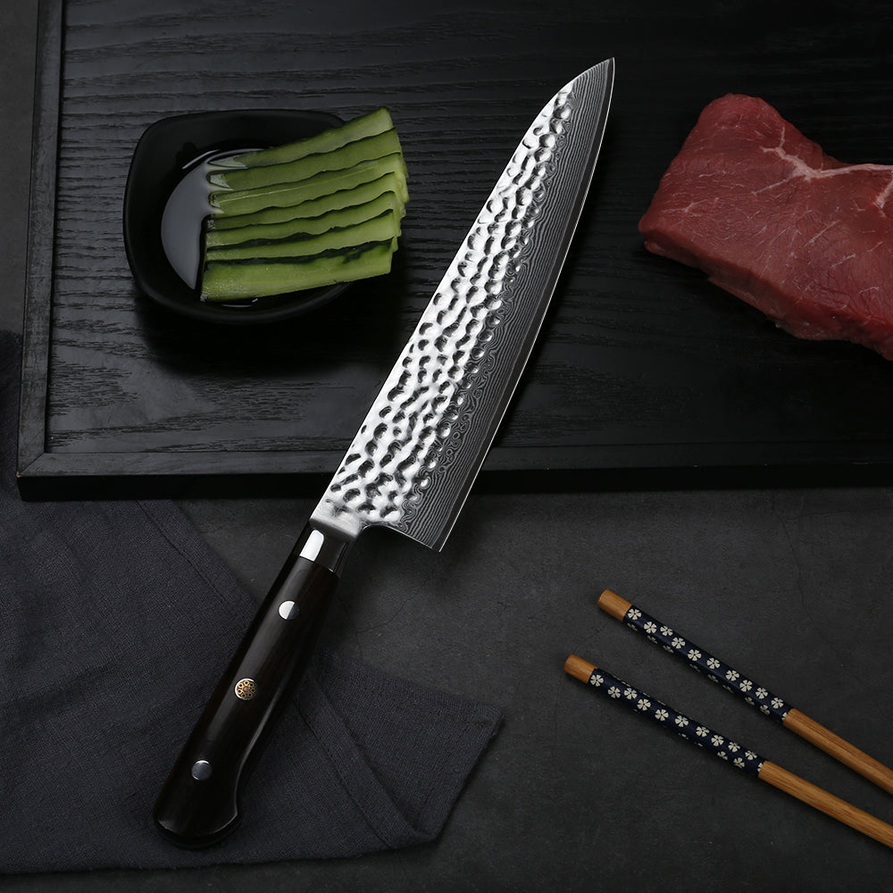 “Gyuto” is a term for a Japanese-style chef’s knife. They are the response to the demand from Western countries for kitchen knives. In the past, Japanese blacksmiths were famous for producing astonishing katanas and other weapons. With time, there was less demand for such products (apart from occasional buys for collection reasons), so blacksmiths focused on producing kitchen knives. In the typical Japanese kitchen, chefs use single-bevel knives, but western versions – wa-gyuto, gyuto have been gaining more and more popularity.  Gyutos are shaped the same way as western chef’s knives and used the same way. It’s nearly impossible to tell a slightly thicker Gyuto with a double bevel and a western-style handle from a western chef’s knife. In other words, Gyutos and chef’s knives are basically the same.