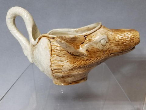 An English Creamware Fox and Swan sauceboat, c1780-90