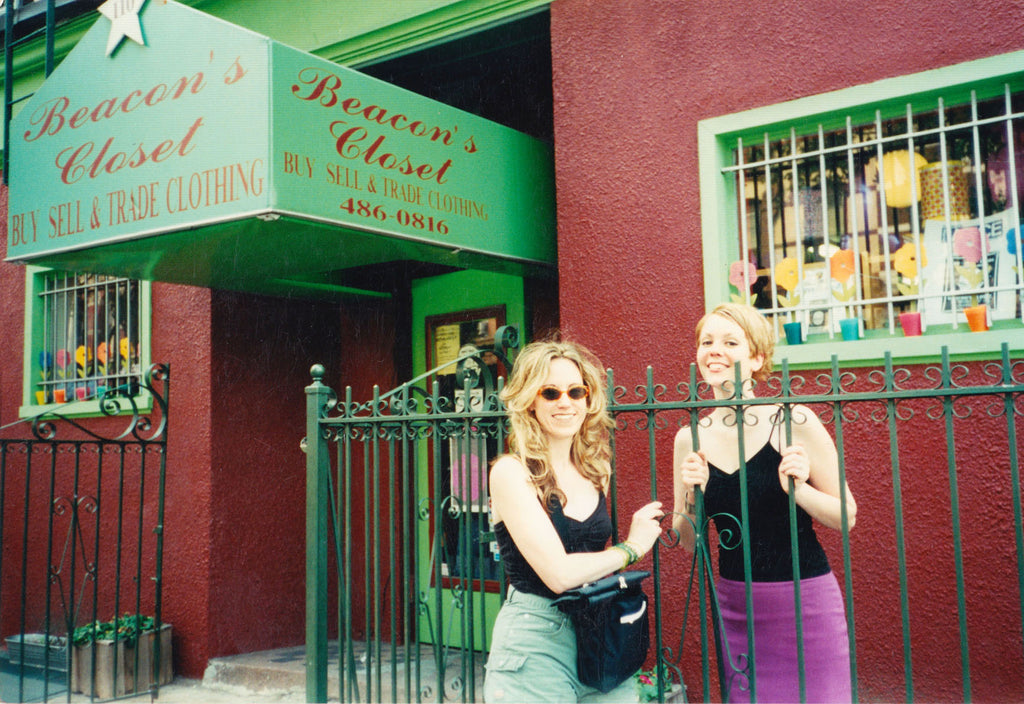 original williamsburg store c 1997, red building with green awning, two women standing at fence