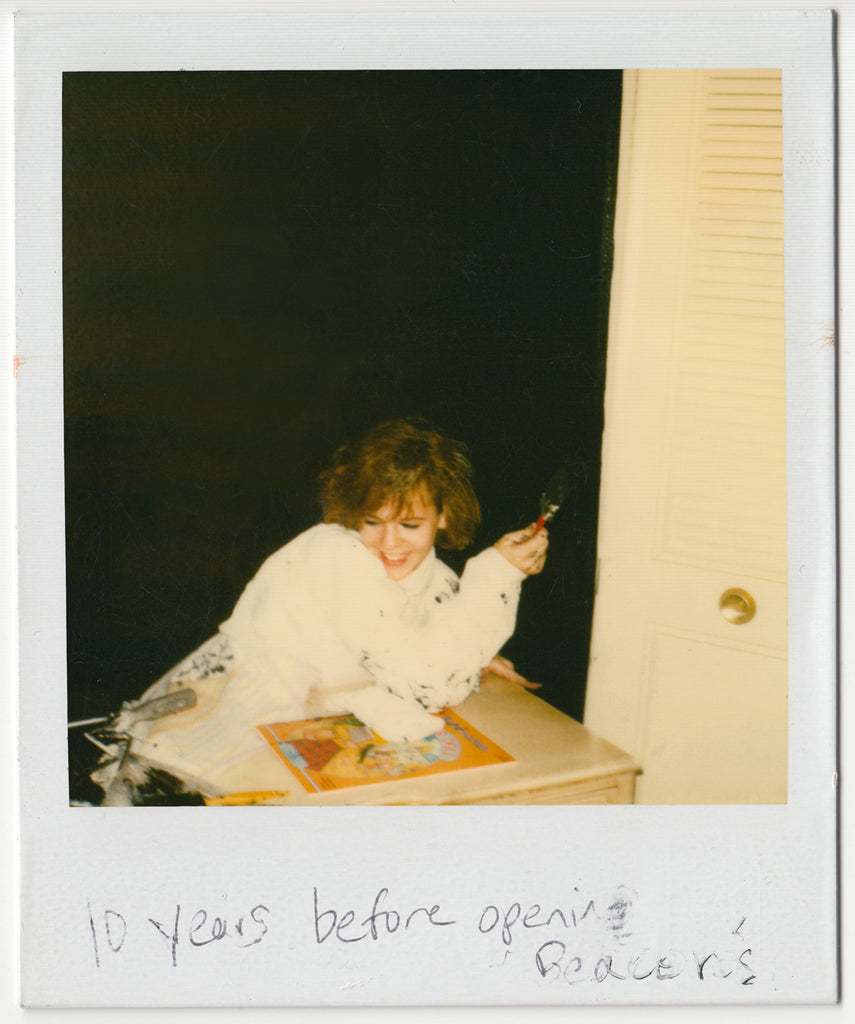 carrie, female 16 years old wearing white jumpsuit and holding a paintbrush, painting the bedroom black c1987
