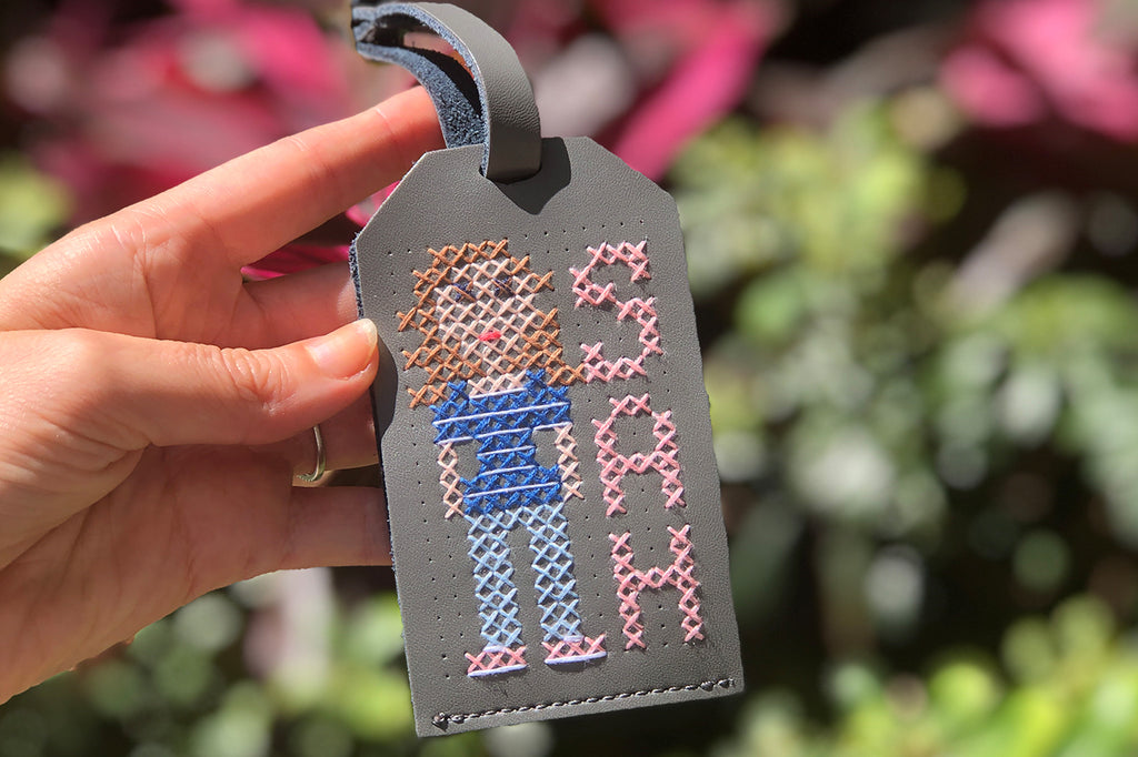 Stitch Luggage Tag in Grey with avatar and initials cross stitched