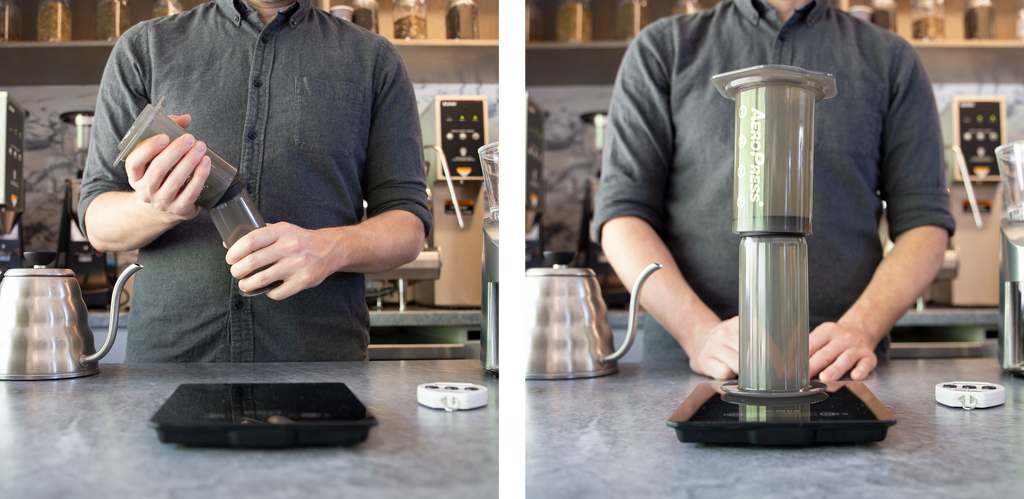  on the left, a person putting together the chamber and plunger of an aeropress. on the right, the assembled aeropress stands in front of that same person