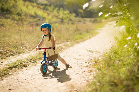 Small child riding a bike