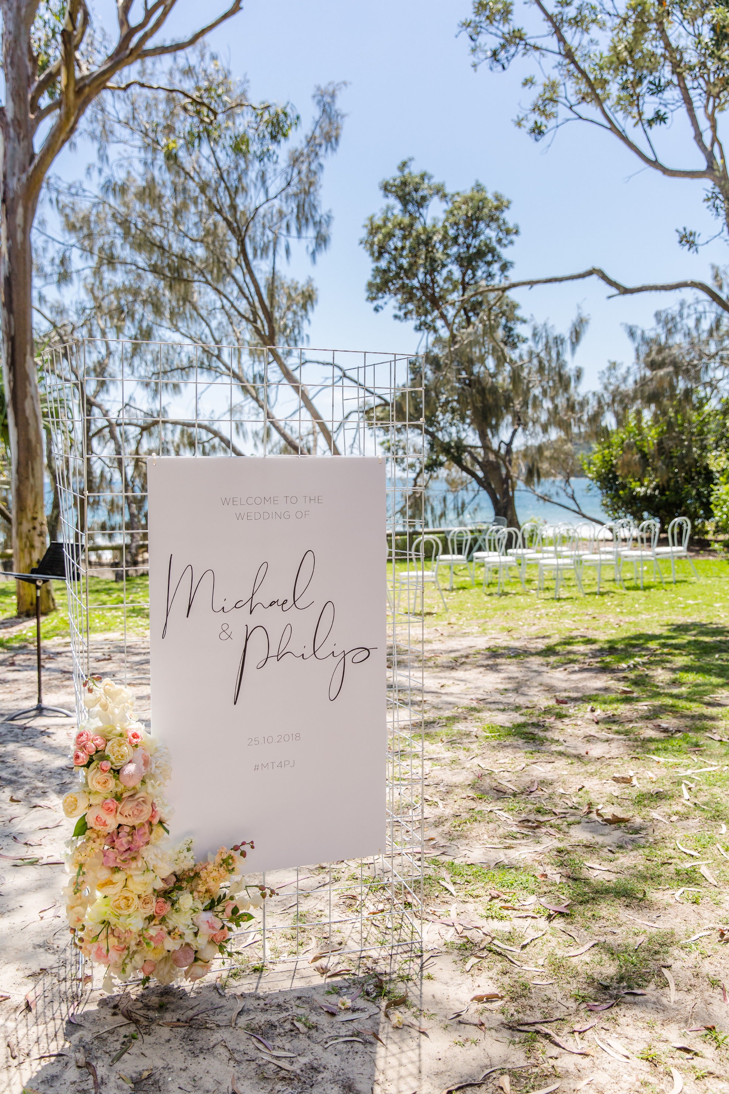 September-Creative-wedding-beach-welcome-sign-same-sex-monochrome