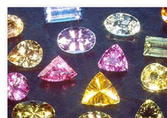 Sapphires of many colours. Pink, yellow, green, blue.