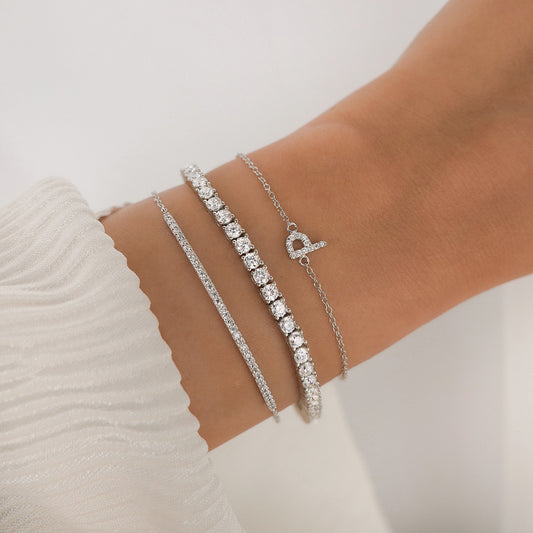 A-Z Bracelet in Silver layered with The Tennis Bracelet and Layla Bracelet