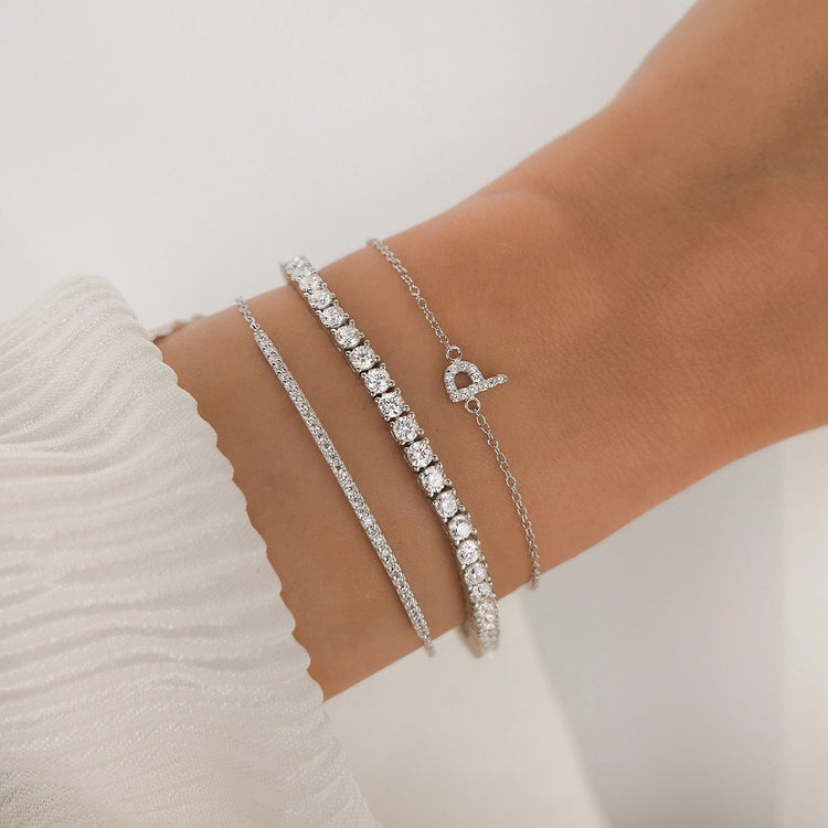 A-Z Bracelet in Silver layered with The Tennis Bracelet and Layla Bracelet