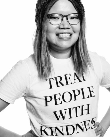 Woman with t-shirt that says treat people with kindness