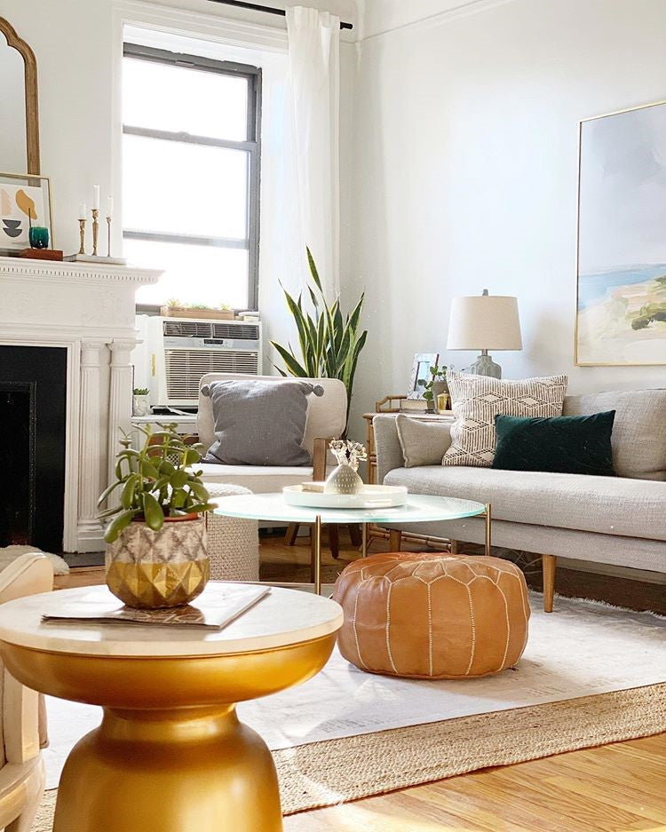 tan brown moroccan pouf in living room