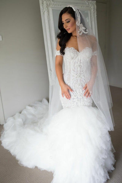 mermaid wedding dress with ruffled skirt