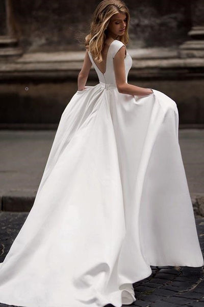 a line wedding dress with pockets