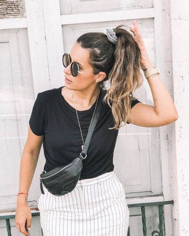Woman wearing our Delta Fanny Pack