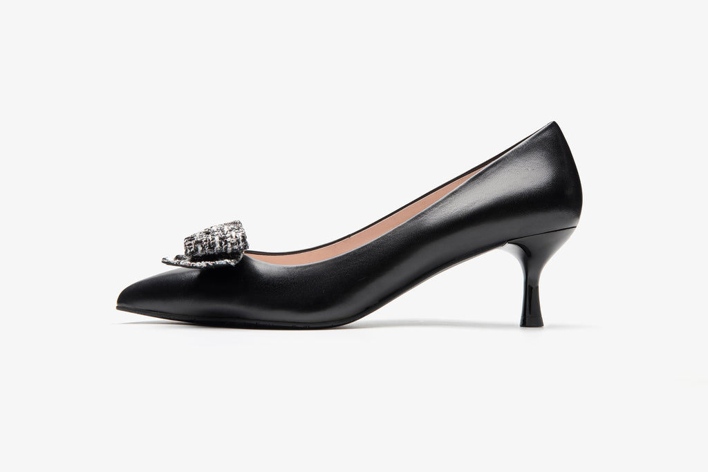 black fabric pumps