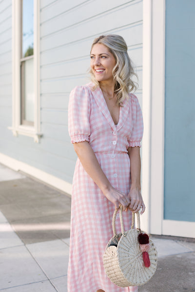 Katie Dean, founder of Katie Dean Jewelry in a pink gingham dress from Reformation, perfectly pink for the Galentine's Brunch hosted by Sarah Tripp of Sassy Red Lipstick at Le Marais Bakery in San Francisco