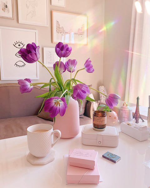 Purple tulips in a pink vase on Katie Dean Jewelry's Desk, The Power of Flowers blog