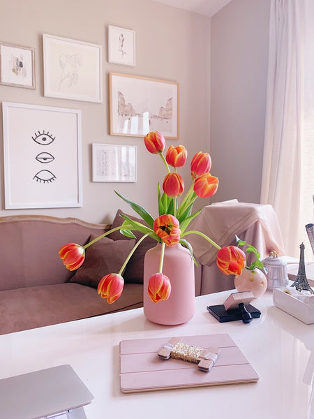 Orange red tulips in a pink vase on Katie Dean Jewelry's Desk, The Power of Flowers blog