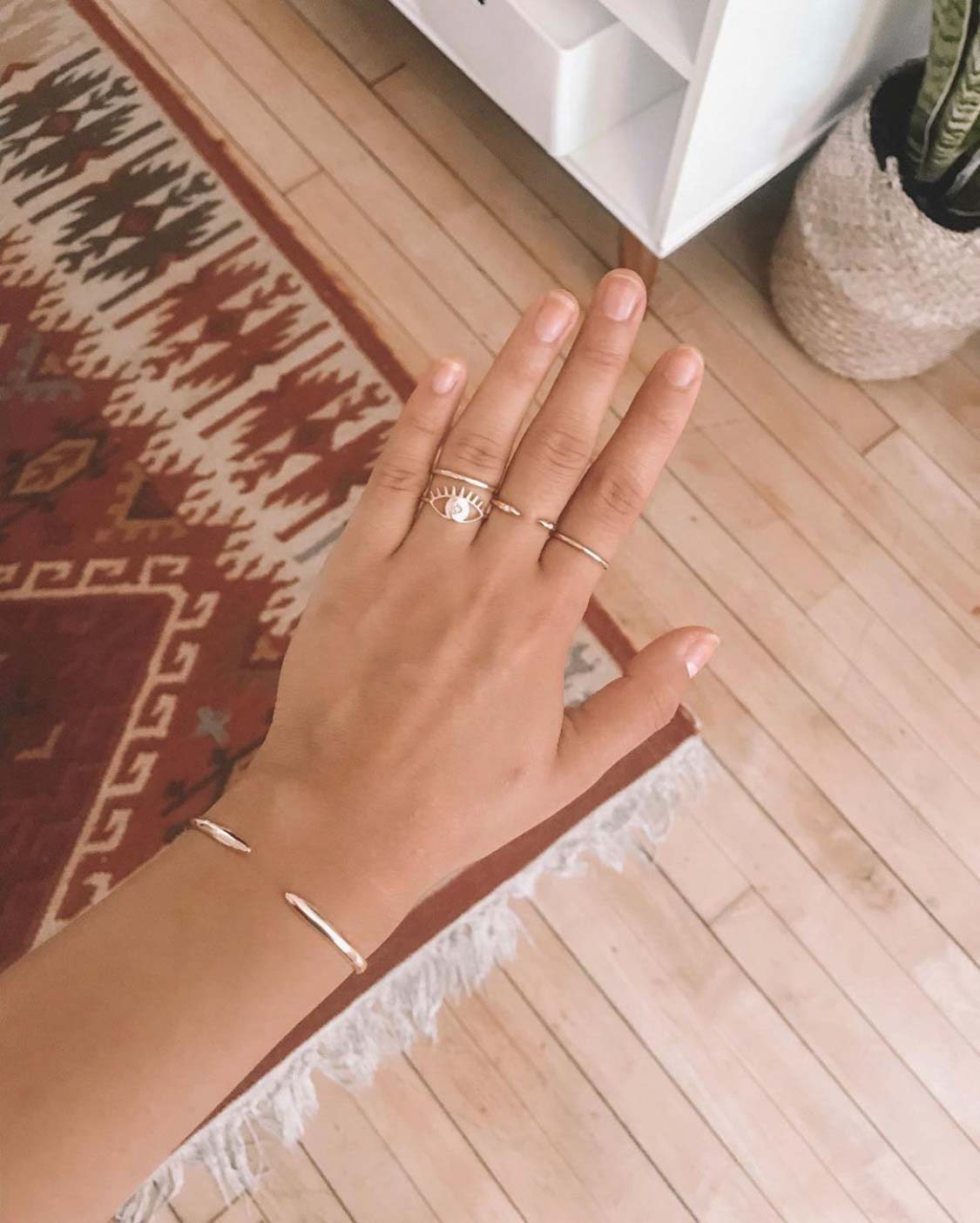 Woman's hand wearing Katie Dean Jewelry Claw Cuff