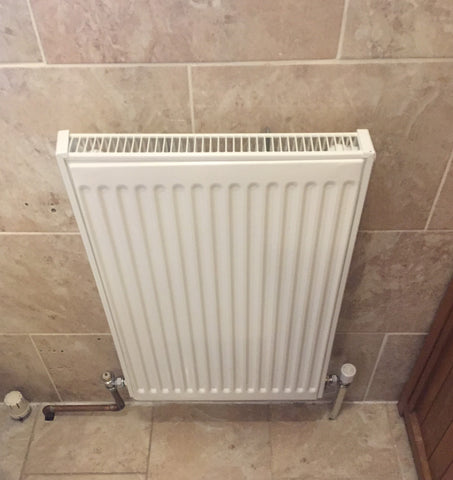removing a radiator from a tiled wall - removing radiator from bathroom