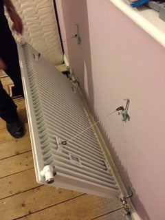 removing a radiator from the wall