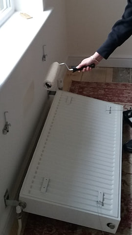decorating behind a radiator - cleaning behind a radiator