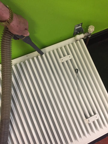 how to remove a radiator from the wall for cleaning