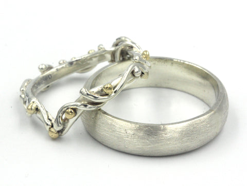 Pair of white gold and yellow gold wedding rings