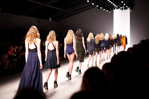 Models on the Catwalk dressed in navy blue
