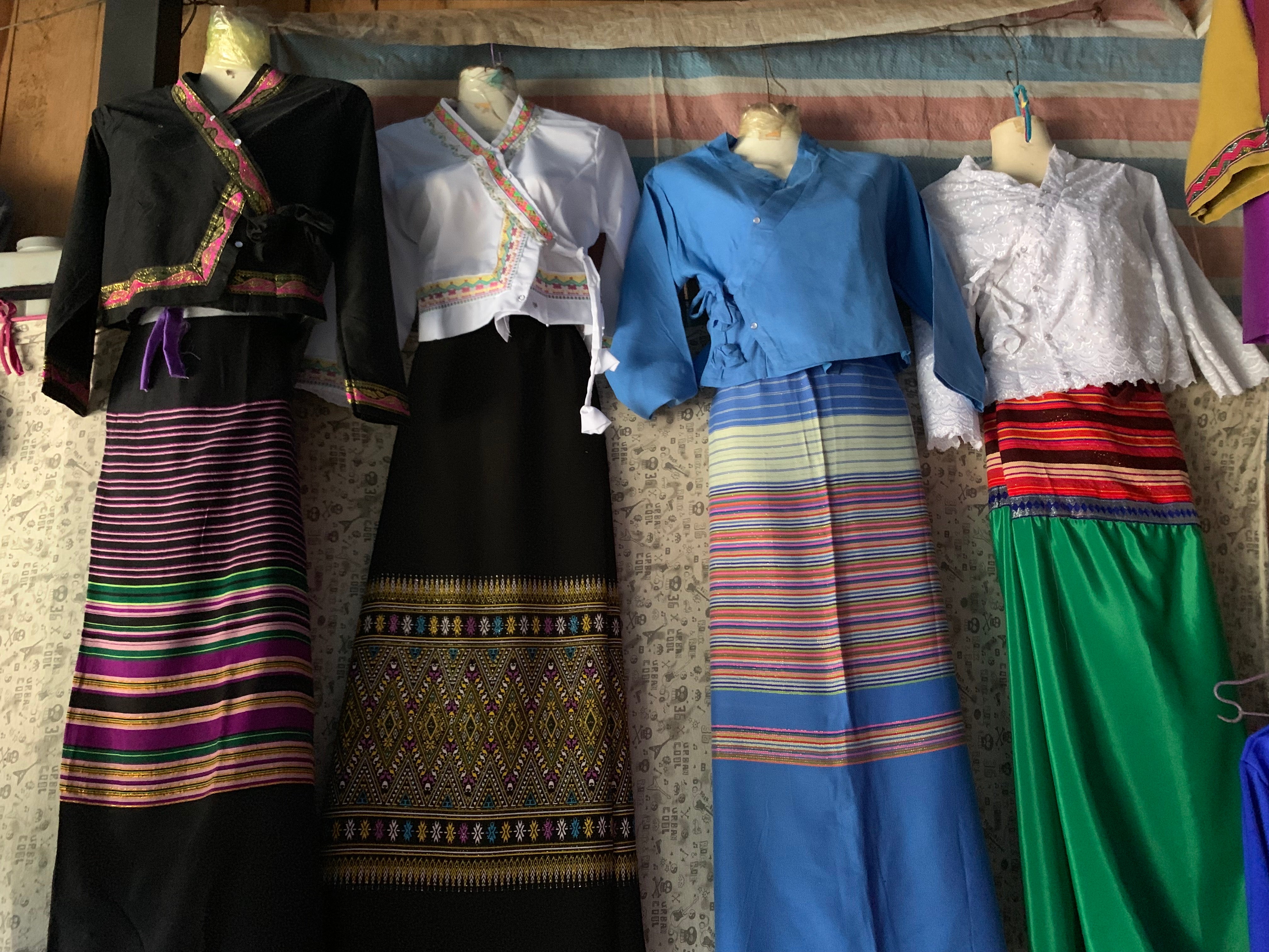 yunnan ethnic group traditional clothing in a local shop