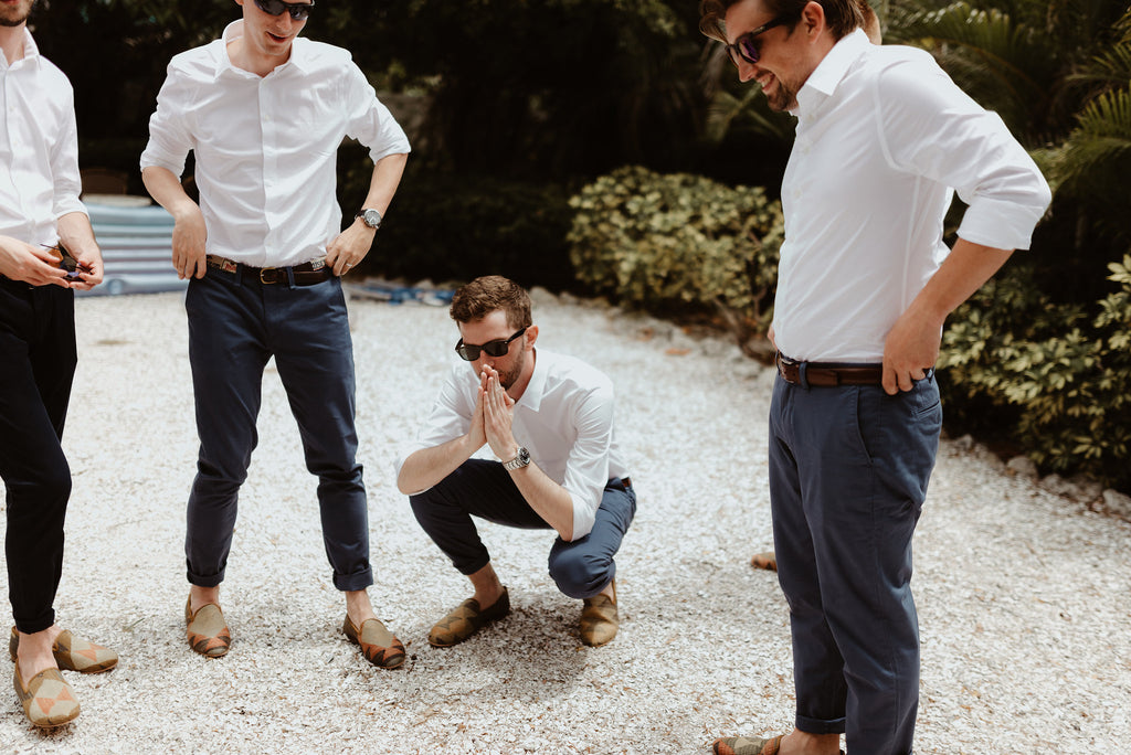 Groomsmen in custom mens kilim loafers cut from the same cloth