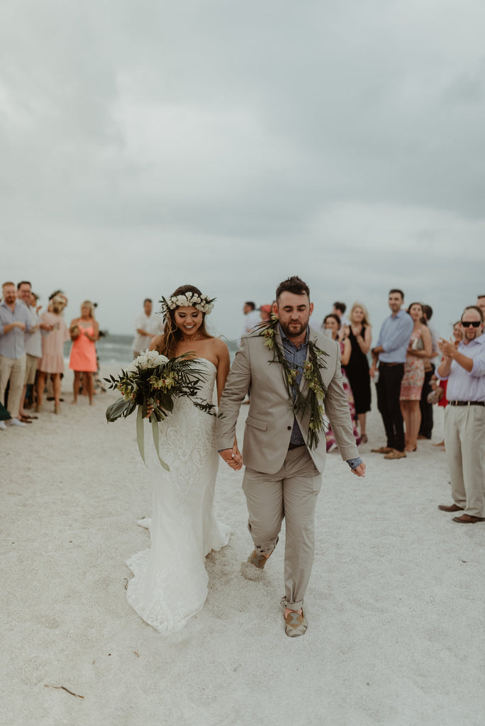 Bride and Groom in kilim shoes leaving ceremony 