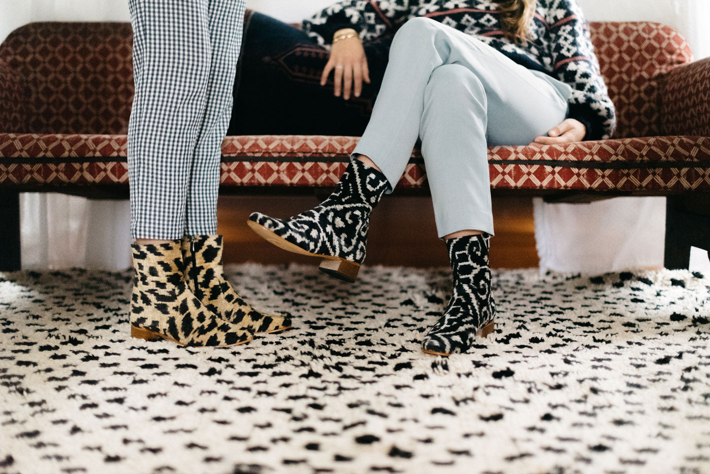 Our velvet boots styled on a moroccan carpet in the designer's home.