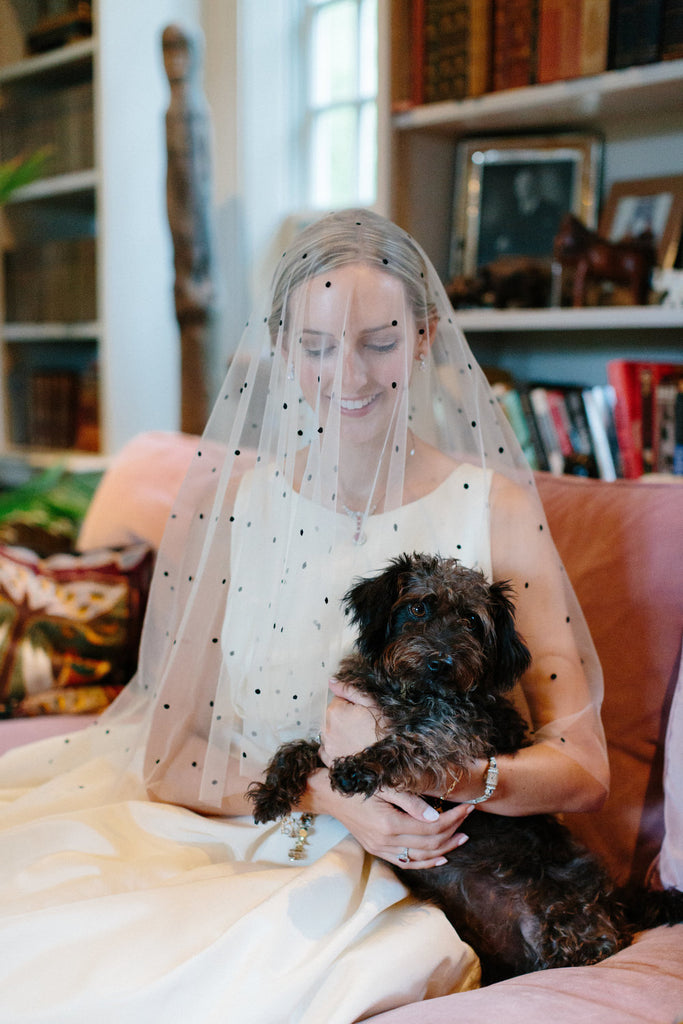 Bride and her dog, Gerry being photographed before the ceremony.