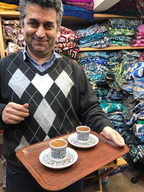 Tea for two while browsing velvet samples in Istanbul. 