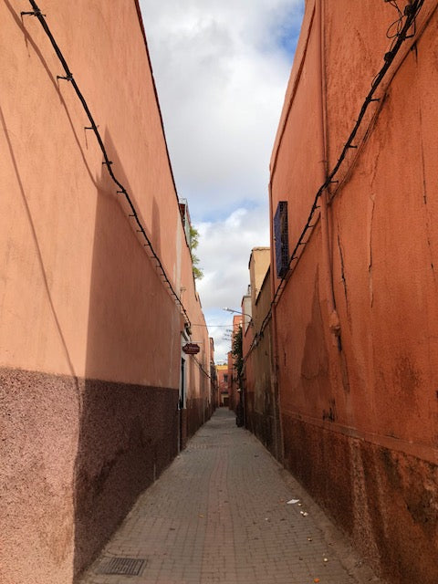 Light pink street with cobblestone in Marrakech.