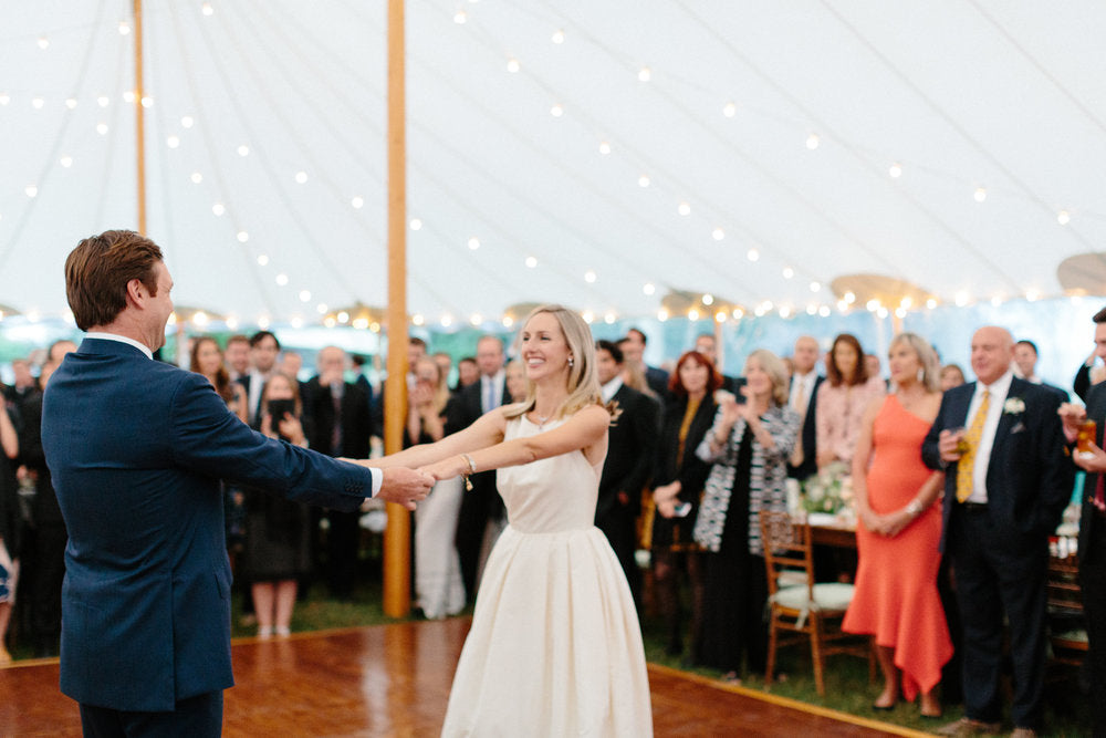 first dance of the bride and groom. Groom dancing in men's kilim loafers, bride dancing in pearl velvet slippers.