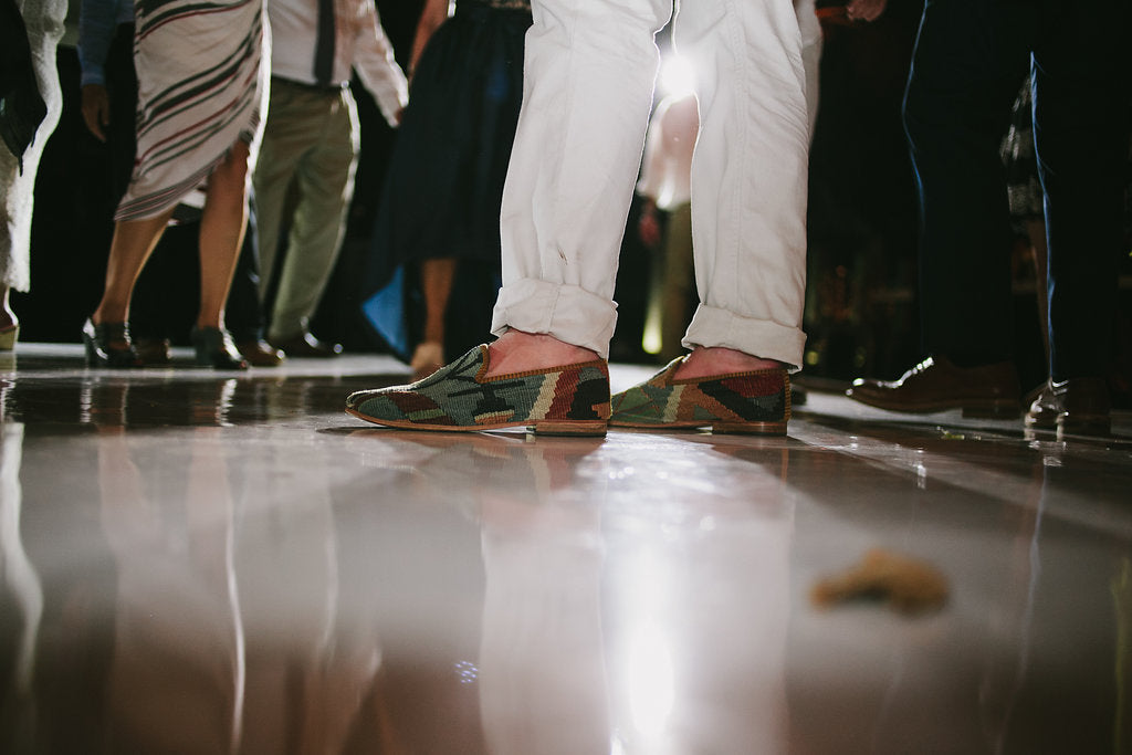 kilim loafer close up on the dance floor