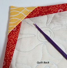 binding flipped to back of quilt