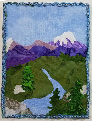 Couching yarn to finish edge of art quilt