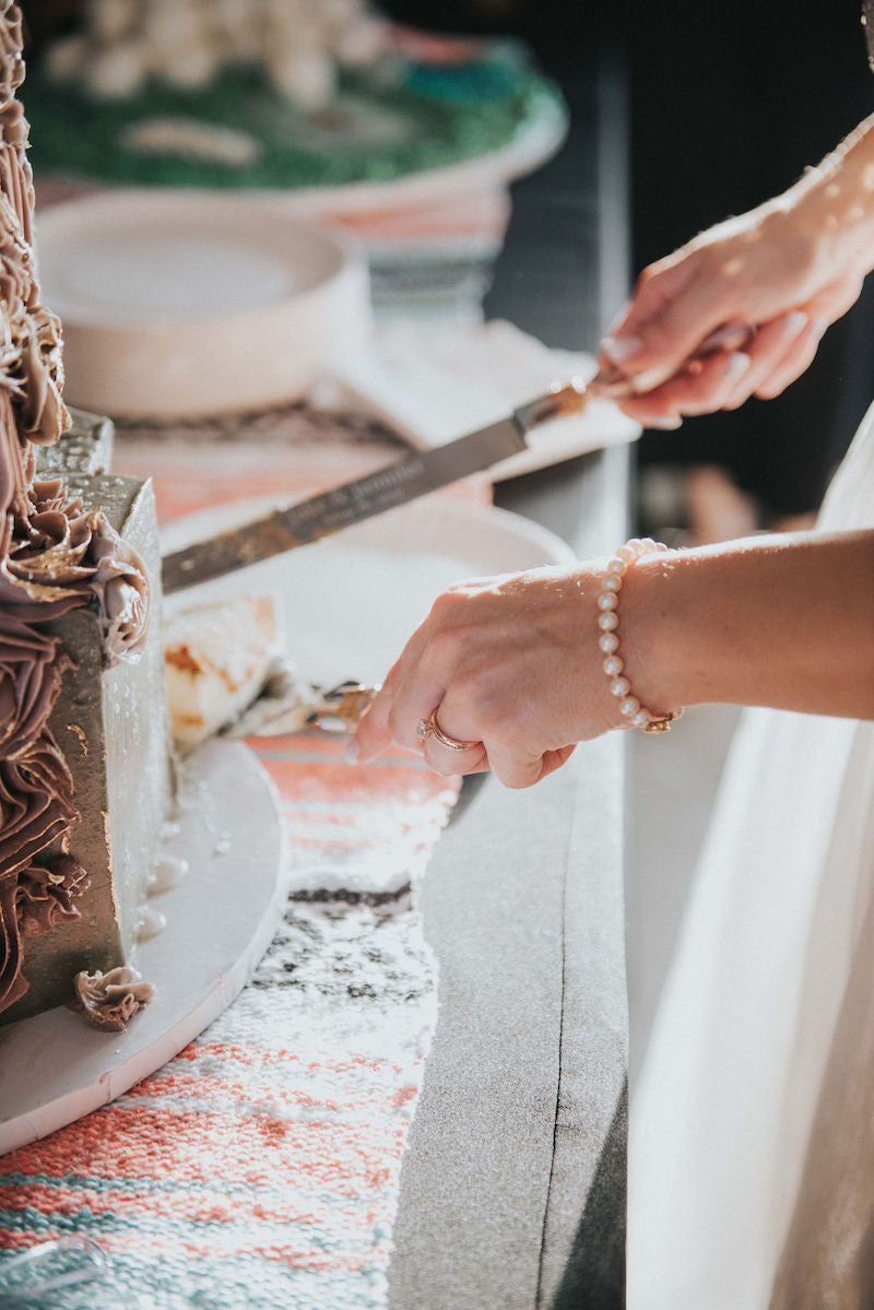 Bride cutting the cake