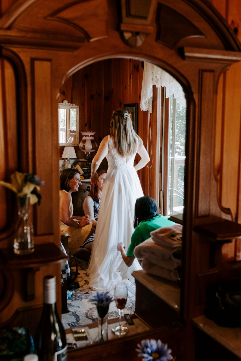 Bride Getting Ready in Mirror